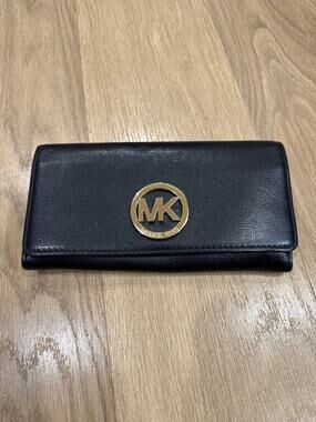 Michael Kors Fulton Continental Flap Wallet in Black Leather